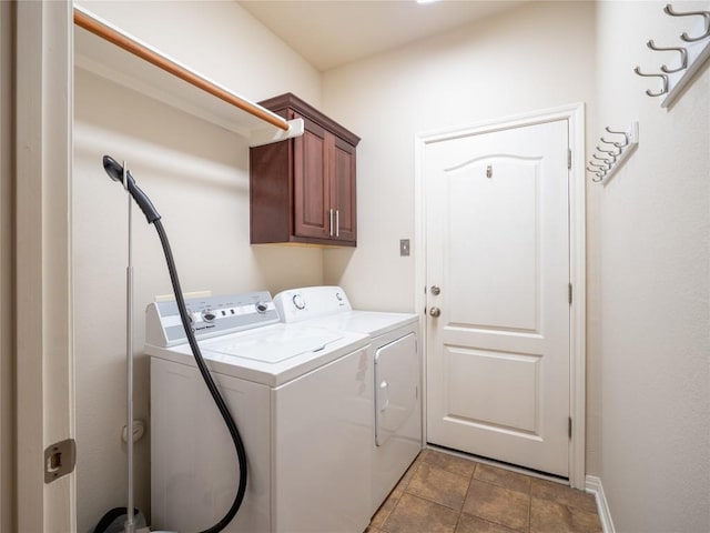 2214 Yellow Bird Trl, Austin, TX 78734 - laundry area with cabinet space, washing machine and clothes dryer, and baseboards