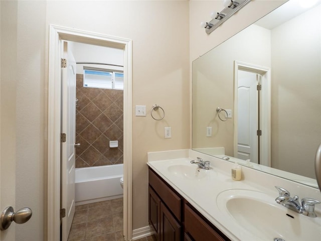 2214 Yellow Bird Trl, Austin, TX 78734 - full bathroom with double vanity, toilet, shower / bathtub combination, and tile patterned floors