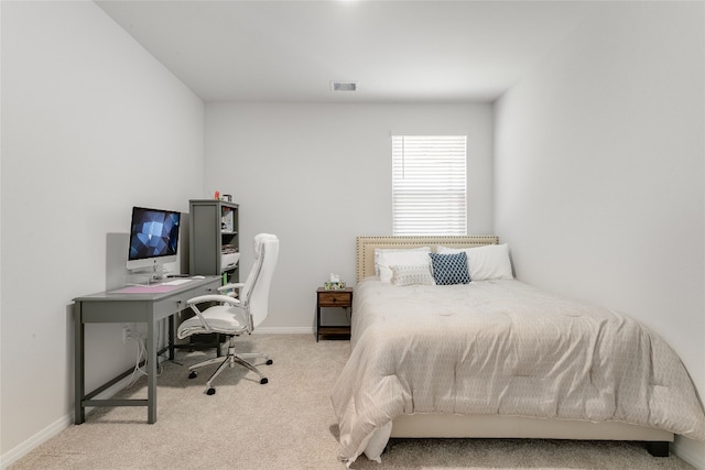 288 Caddo Bnd, Kyle, TX 78640 - carpeted bedroom with an office area and baseboards