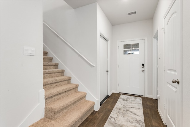 288 Caddo Bnd, Kyle, TX 78640 - foyer featuring stairway and dark wood-type flooring