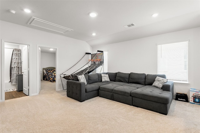 288 Caddo Bnd, Kyle, TX 78640 - carpeted living room with attic access, plenty of natural light, recessed lighting, and lofted ceiling