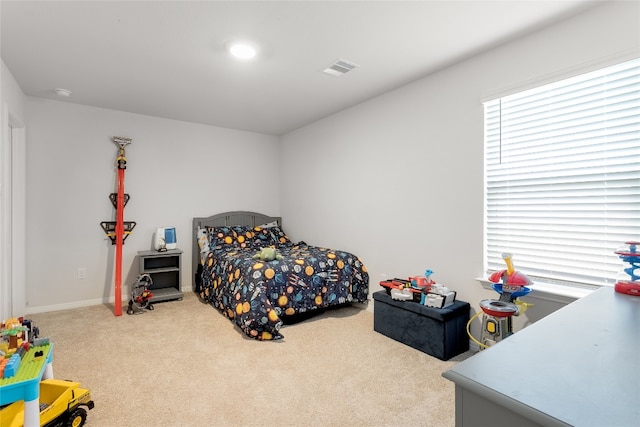 288 Caddo Bnd, Kyle, TX 78640 - carpeted bedroom featuring baseboards
