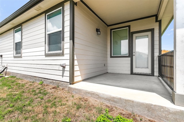 288 Caddo Bnd, Kyle, TX 78640 - view of exterior entry with a patio