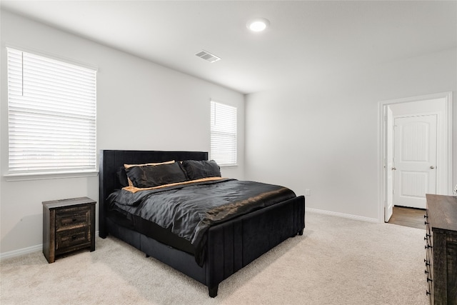 288 Caddo Bnd, Kyle, TX 78640 - bedroom with light colored carpet and baseboards