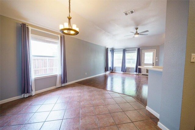 1118 Connemara Ln, Pflugerville, TX 78660 - tiled empty room with a ceiling fan and baseboards