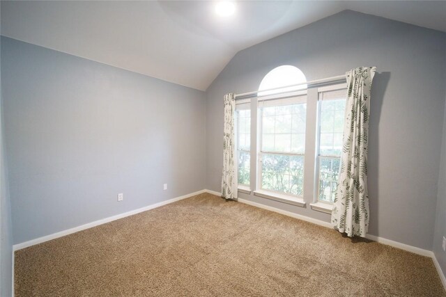 1118 Connemara Ln, Pflugerville, TX 78660 - carpeted spare room with vaulted ceiling and baseboards