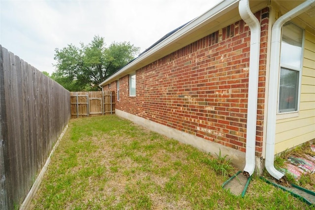 1118 Connemara Ln, Pflugerville, TX 78660 - view of side of home with brick siding