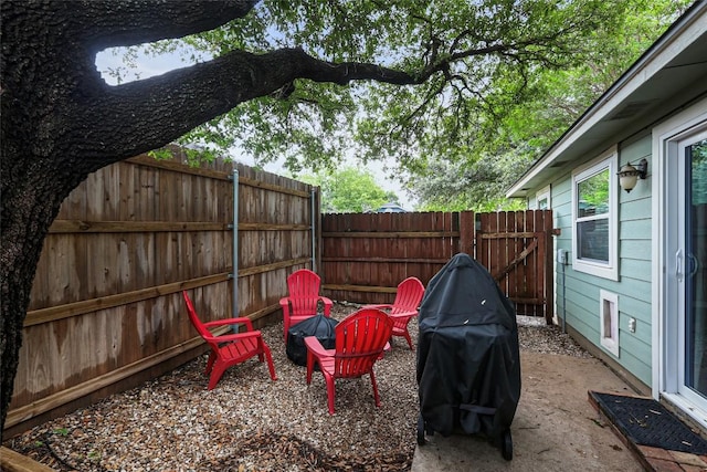 12320 Cedarspur Rd, Austin, TX 78758 - fenced backyard with a fire pit and a patio
