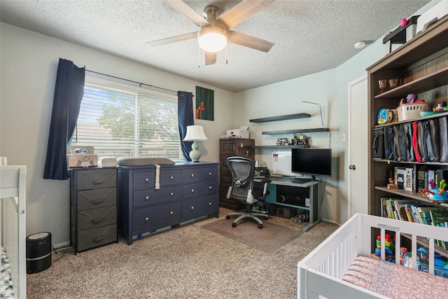12320 Cedarspur Rd, Austin, TX 78758 - carpeted bedroom featuring a textured ceiling, a desk, and ceiling fan