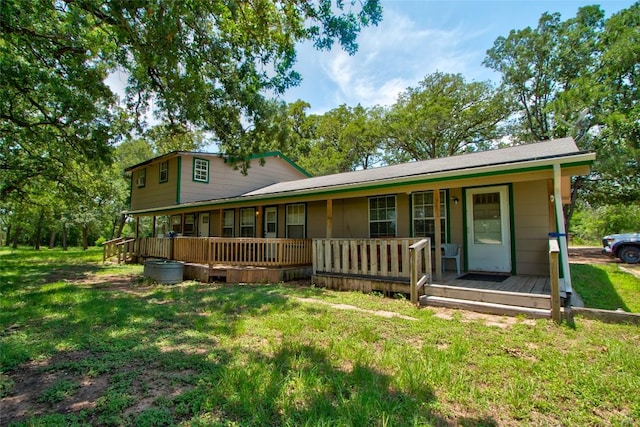 1162 N State Highway 95, Bastrop, TX 78602 - view of front of house with a porch and a front lawn