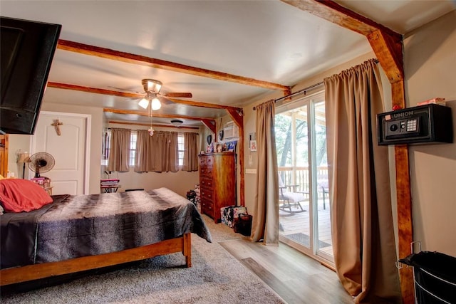 1162 N State Highway 95, Bastrop, TX 78602 - bedroom with light wood-style flooring and access to outside