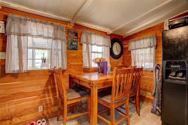 1162 N State Highway 95, Bastrop, TX 78602 - dining space featuring wood walls and lofted ceiling