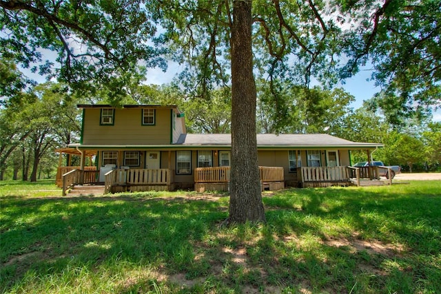 1162 N State Highway 95, Bastrop, TX 78602 - back of property featuring a porch and a yard