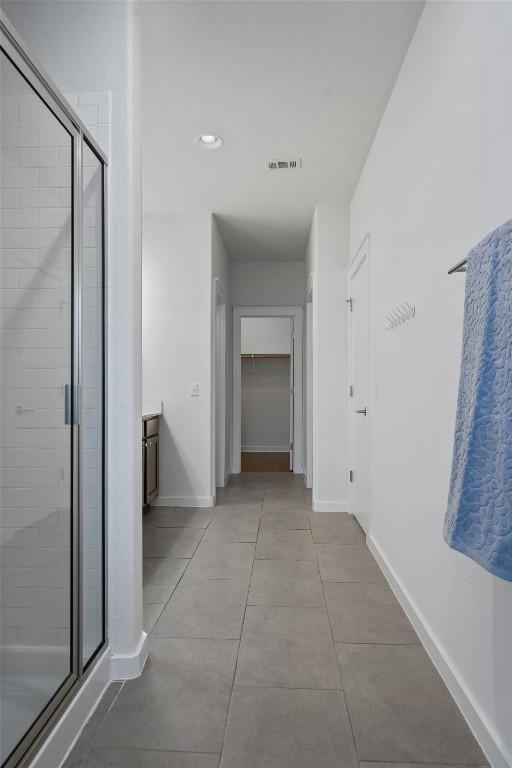 8940 Parker Ranch Cir Unit B, Austin, TX 78748 - hall with baseboards and light tile patterned floors