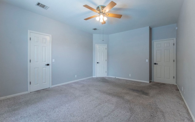 208 Settlers Valley Dr, Pflugerville, TX 78660 - unfurnished bedroom featuring carpet, baseboards, a ceiling fan, and attic access