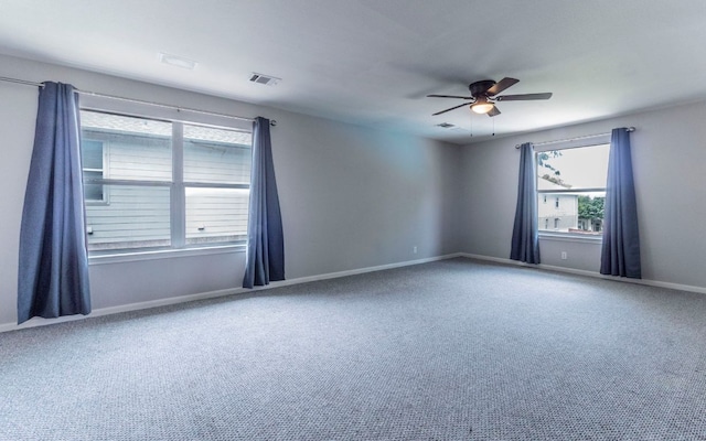 208 Settlers Valley Dr, Pflugerville, TX 78660 - spare room with a ceiling fan, carpet flooring, and baseboards
