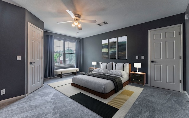 208 Settlers Valley Dr, Pflugerville, TX 78660 - bedroom featuring carpet floors, baseboards, a ceiling fan, and a textured ceiling