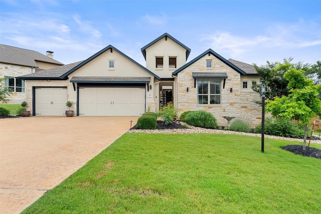 403 Baldovino Skwy, Austin, TX 78738 - view of front facade featuring an attached garage, stone siding, a front yard, driveway, and stucco siding