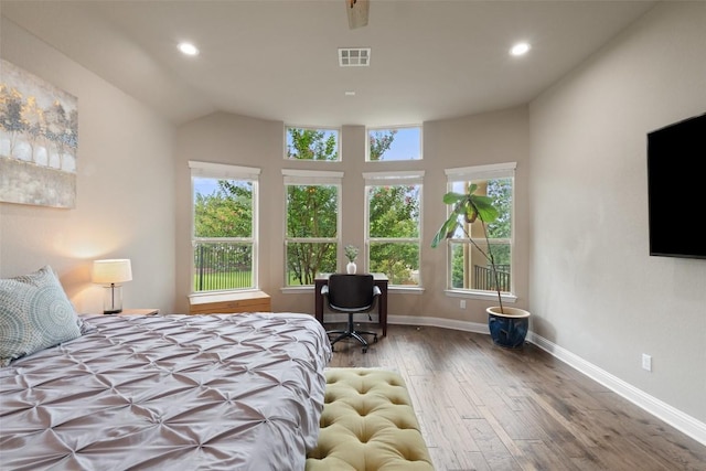 403 Baldovino Skwy, Austin, TX 78738 - bedroom featuring hardwood / wood-style floors, recessed lighting, and vaulted ceiling