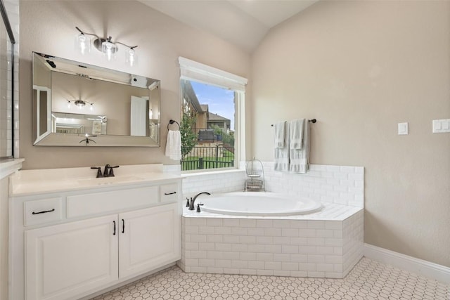 403 Baldovino Skwy, Austin, TX 78738 - full bathroom with vanity, a bath, and lofted ceiling
