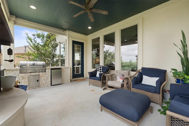 403 Baldovino Skwy, Austin, TX 78738 - view of patio featuring exterior kitchen, ceiling fan, and outdoor lounge area