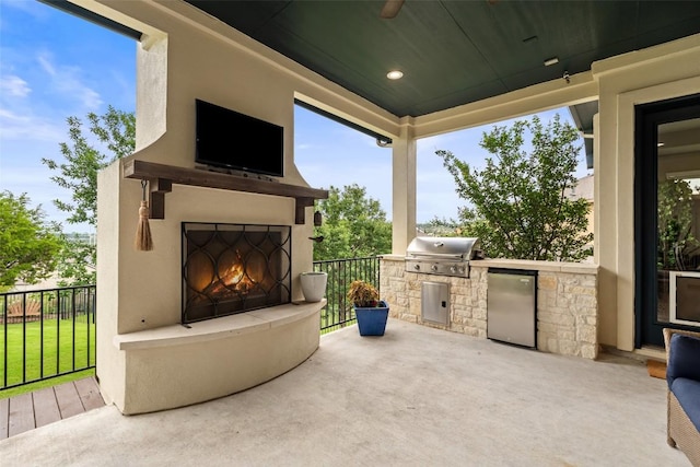 403 Baldovino Skwy, Austin, TX 78738 - view of patio / terrace featuring a large fireplace and area for grilling