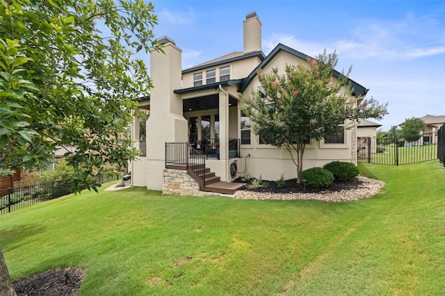 403 Baldovino Skwy, Austin, TX 78738 - back of property with a chimney, stucco siding, and french doors