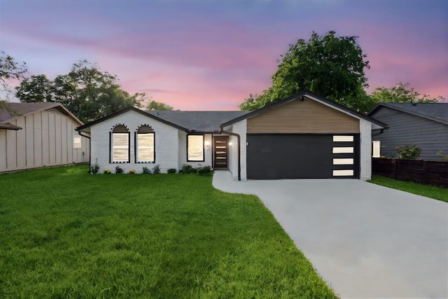 6102 Amber Pass, Austin, TX 78745 - view of front of home featuring driveway and an attached garage
