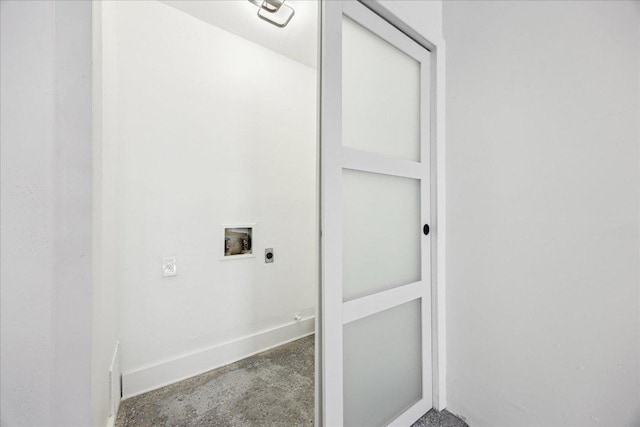 6102 Amber Pass, Austin, TX 78745 - laundry area featuring hookup for an electric dryer, hookup for a washing machine, and baseboards