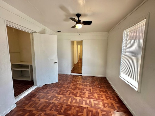 5005 S Pleasant Valley Rd, Austin, TX 78744 - empty room featuring ceiling fan and baseboards