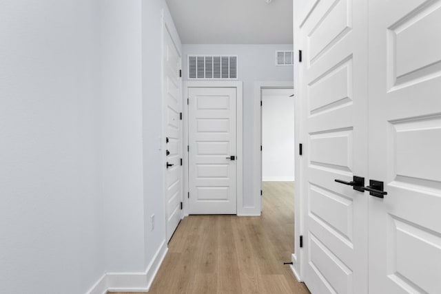 2500 Longview St Unit 101, Austin, TX 78705 - hall featuring light wood-style floors and baseboards