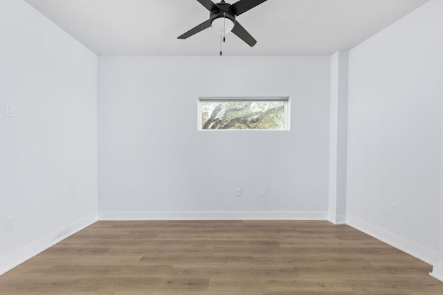 2500 Longview St Unit 101, Austin, TX 78705 - empty room with ceiling fan, wood finished floors, and baseboards