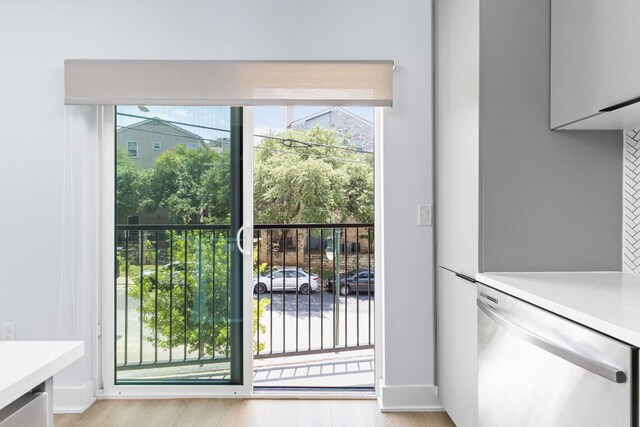 2500 Longview St Unit 101, Austin, TX 78705 - doorway featuring plenty of natural light and light wood-type flooring