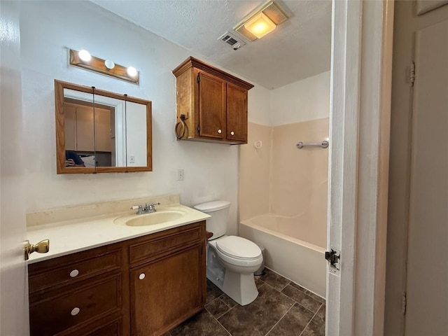 429 Camelback Rd, La Grange, TX 78945 - bathroom with vanity, toilet, and washtub / shower combination