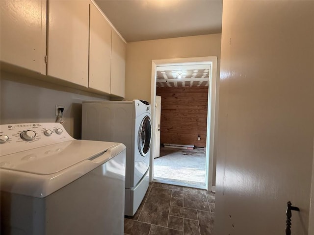 429 Camelback Rd, La Grange, TX 78945 - washroom with washer and dryer, cabinet space, and wood walls