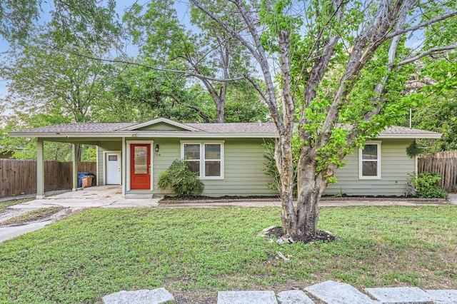 704 Wren Ave, Austin, TX 78753 - single story home featuring a carport and driveway