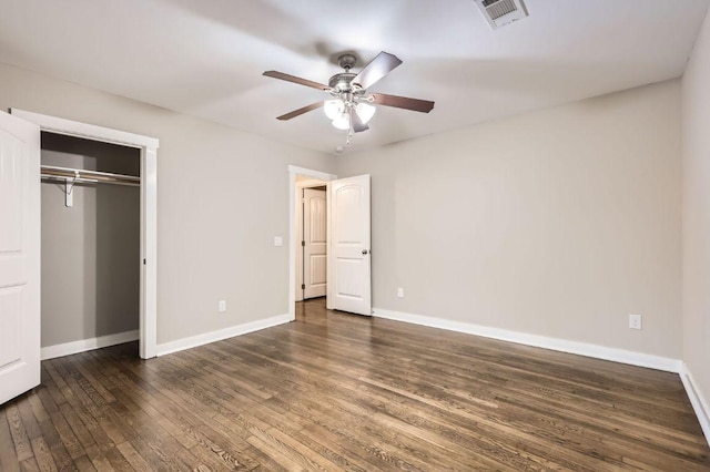 704 Wren Ave, Austin, TX 78753 - unfurnished bedroom with wood finished floors, baseboards, a closet, and a ceiling fan