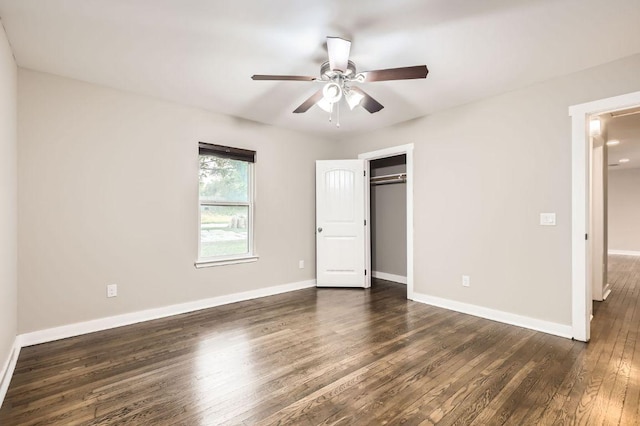 704 Wren Ave, Austin, TX 78753 - unfurnished bedroom with dark wood-style flooring, a closet, and a ceiling fan