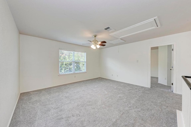 2701 Bolton St, Austin, TX 78748 - carpeted empty room featuring attic access, a ceiling fan, and baseboards