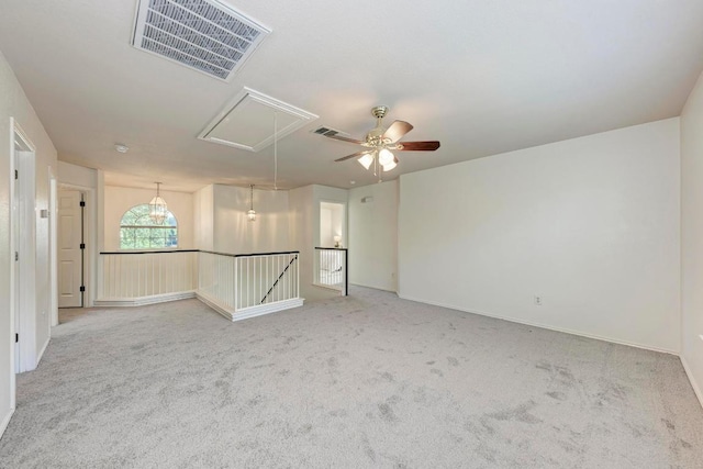 2701 Bolton St, Austin, TX 78748 - spare room with attic access, carpet floors, ceiling fan, and baseboards