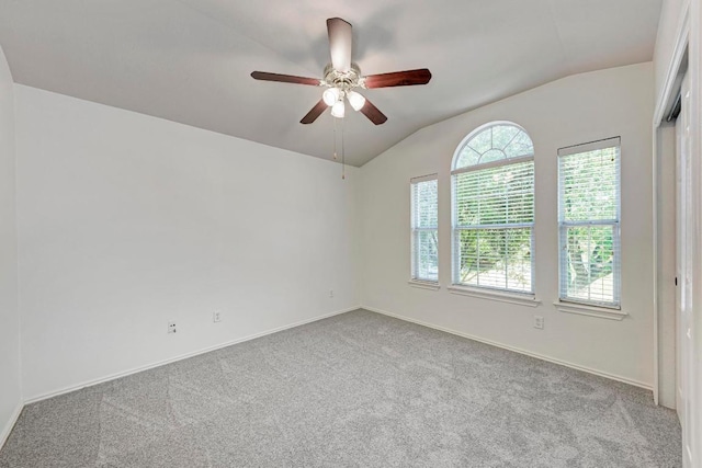 2701 Bolton St, Austin, TX 78748 - carpeted empty room with lofted ceiling, ceiling fan, and baseboards