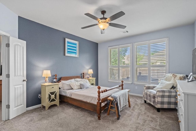 13625 Glen Creek Ct, Manor, TX 78653 - bedroom with light colored carpet, baseboards, and ceiling fan