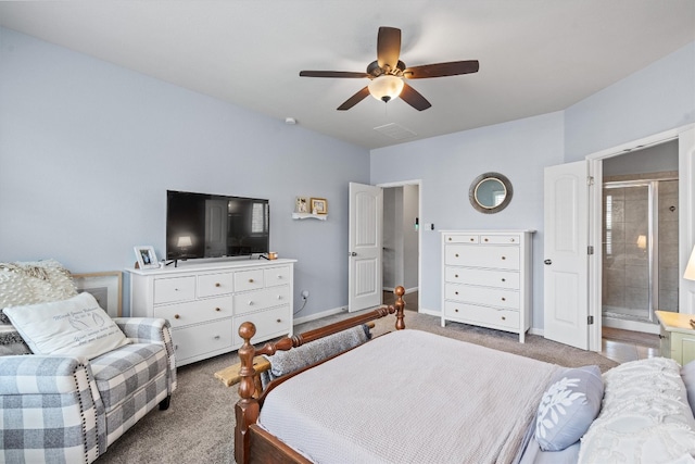 13625 Glen Creek Ct, Manor, TX 78653 - bedroom featuring carpet flooring, baseboards, ensuite bath, and a ceiling fan