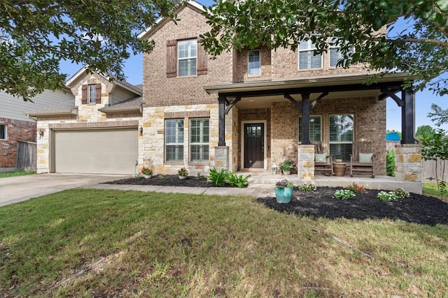 13625 Glen Creek Ct, Manor, TX 78653 - view of front of property with a porch, driveway, a front lawn, a garage, and brick siding
