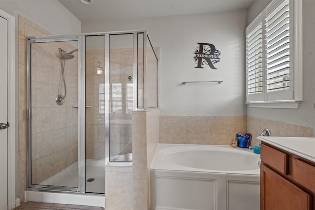 13625 Glen Creek Ct, Manor, TX 78653 - bathroom with a bath, a shower stall, and vanity