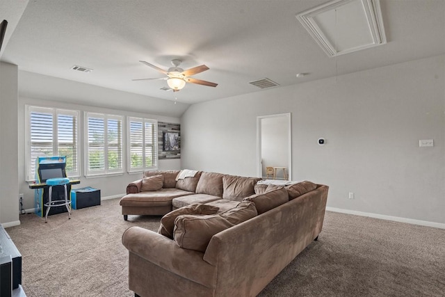 13625 Glen Creek Ct, Manor, TX 78653 - carpeted living room featuring attic access, a ceiling fan, and baseboards