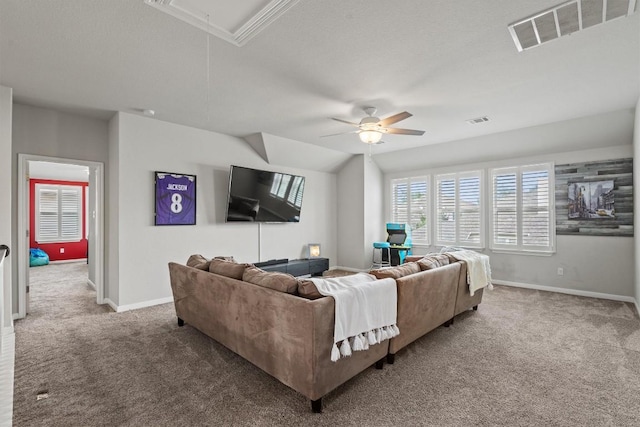 13625 Glen Creek Ct, Manor, TX 78653 - carpeted living area with attic access, ceiling fan, and baseboards