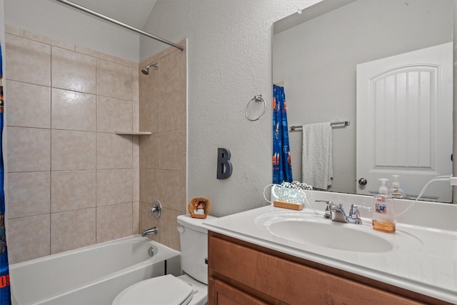 13625 Glen Creek Ct, Manor, TX 78653 - bathroom with toilet, vanity, a textured wall, and shower / bath combo