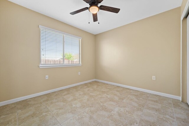 6317 Vida Nueva Ave, Del Valle, TX 78617 - empty room featuring a ceiling fan and baseboards