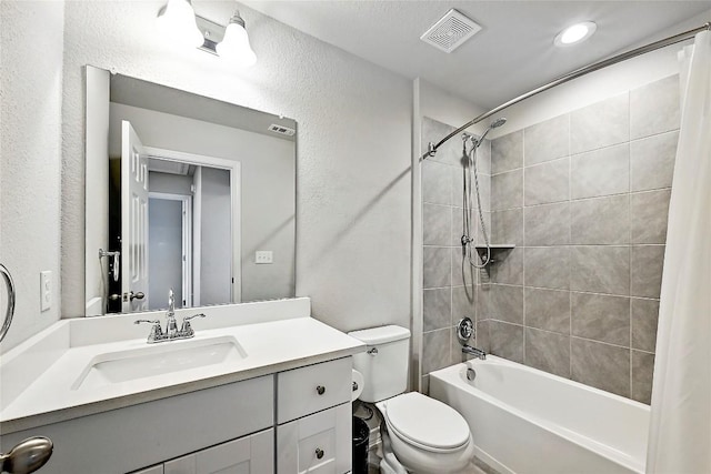 1304 Eagle Ridge Trl, Leander, TX 78641 - bathroom with shower / bathtub combination with curtain, vanity, recessed lighting, and a textured wall